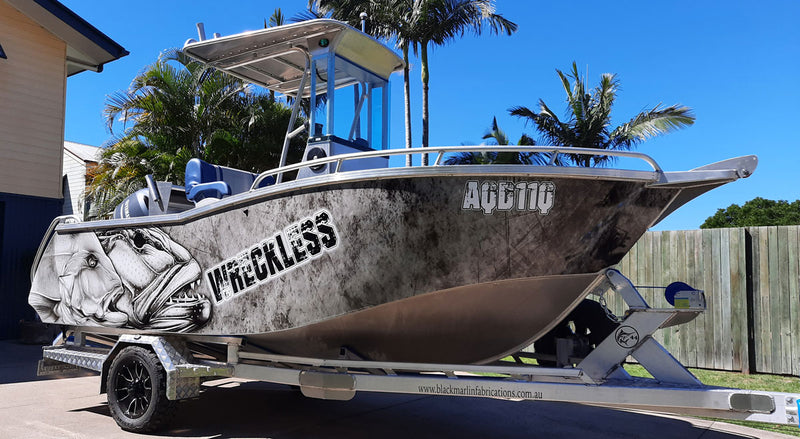 Grunge barramundi and a coral trout Boat wrap