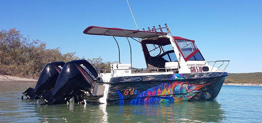 A boat wrap featuring a full colour malin with the name G'day