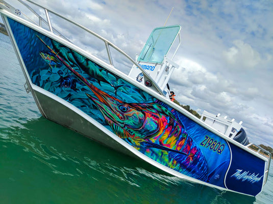 a boat wrap featuring a marlin and the boat name